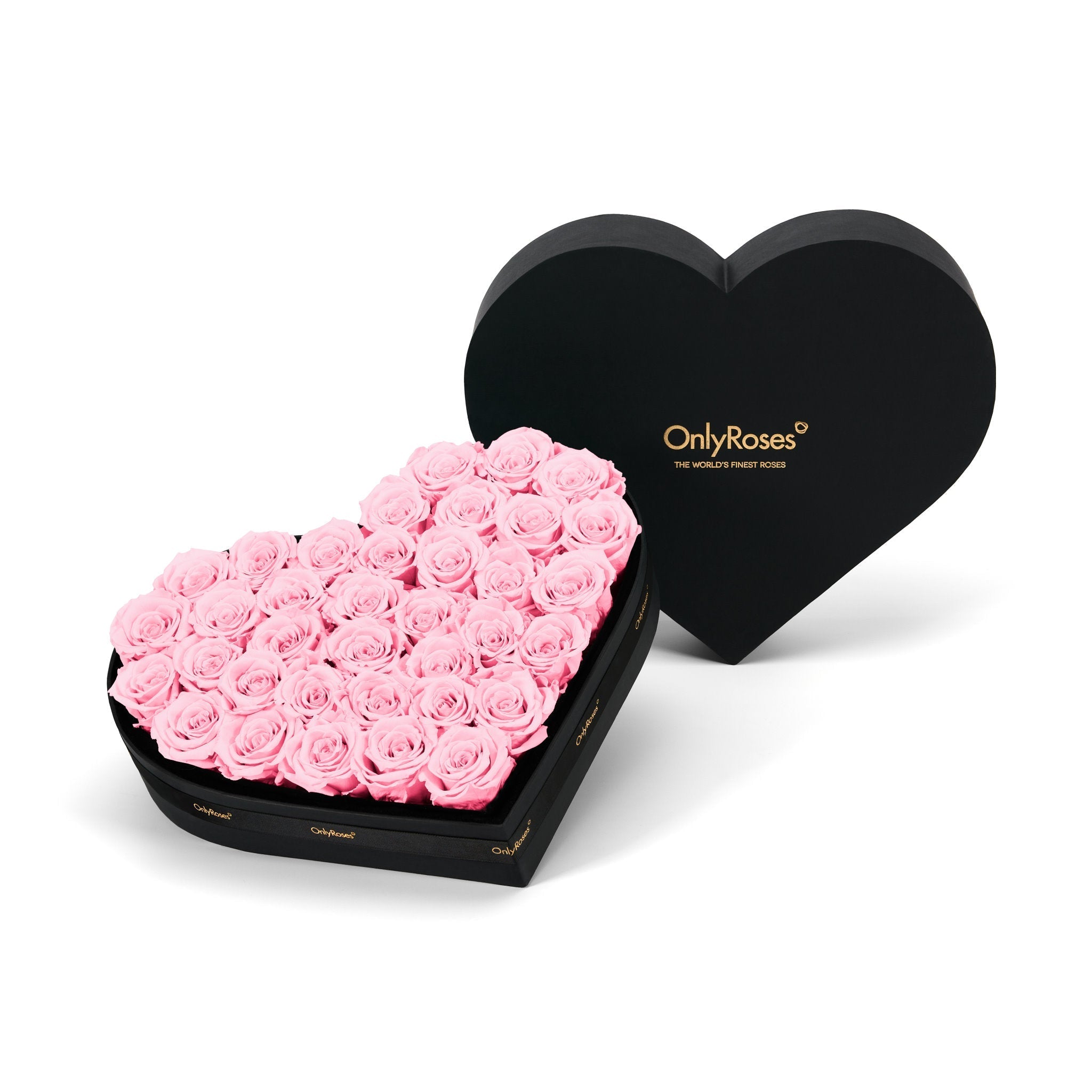Heart-shaped box of pink roses with 'OnlyRoses' branding on a white background